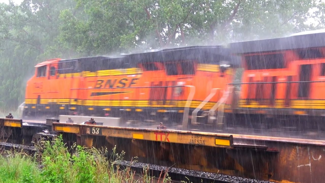BNSF and CSX Trains in the Rain. CSXT Engine # 88