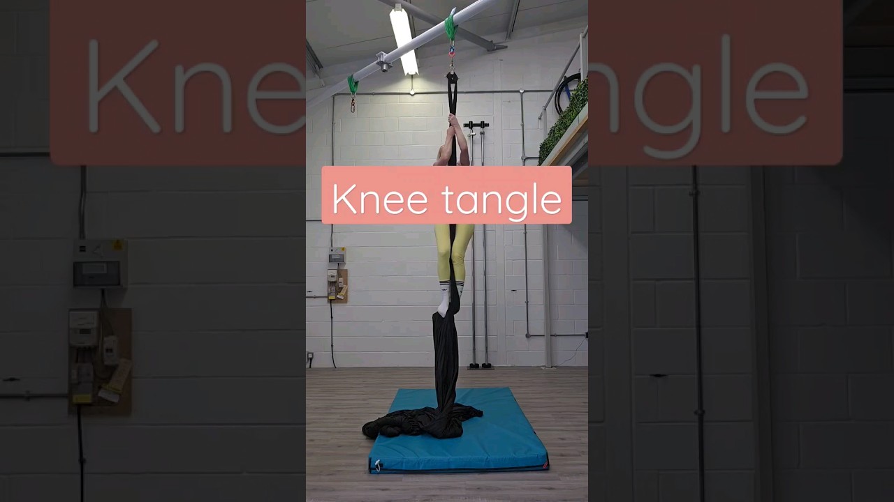 Aerial silks knee tangle #aerial #aerialsilkstricks #aerialsilks #shorts