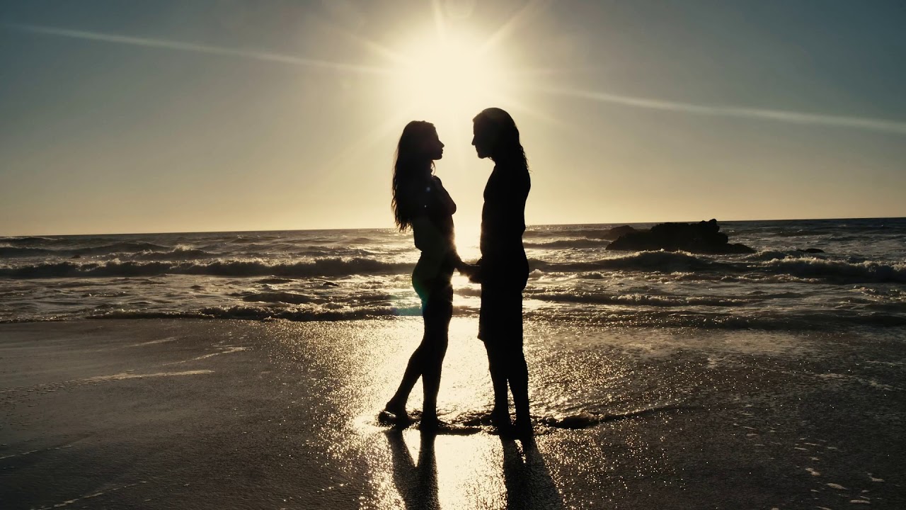 Couple holding hand on the beach| Free HD videos-no copyright