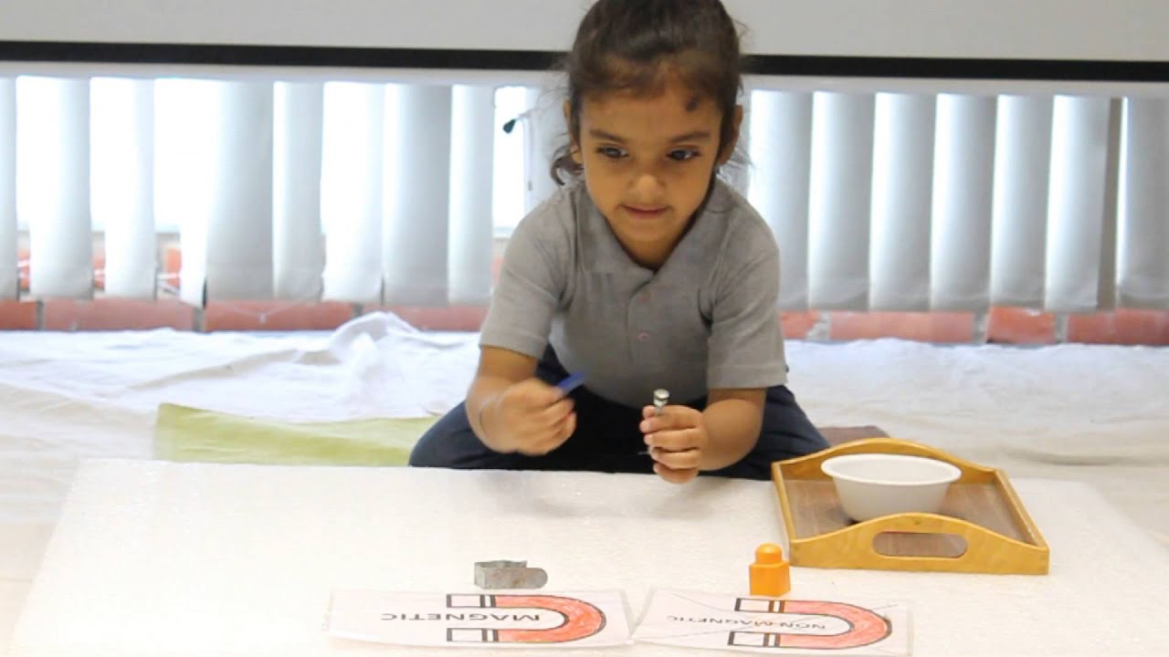 Three year old differentiating between Magnetic and Non-Magnetic Items