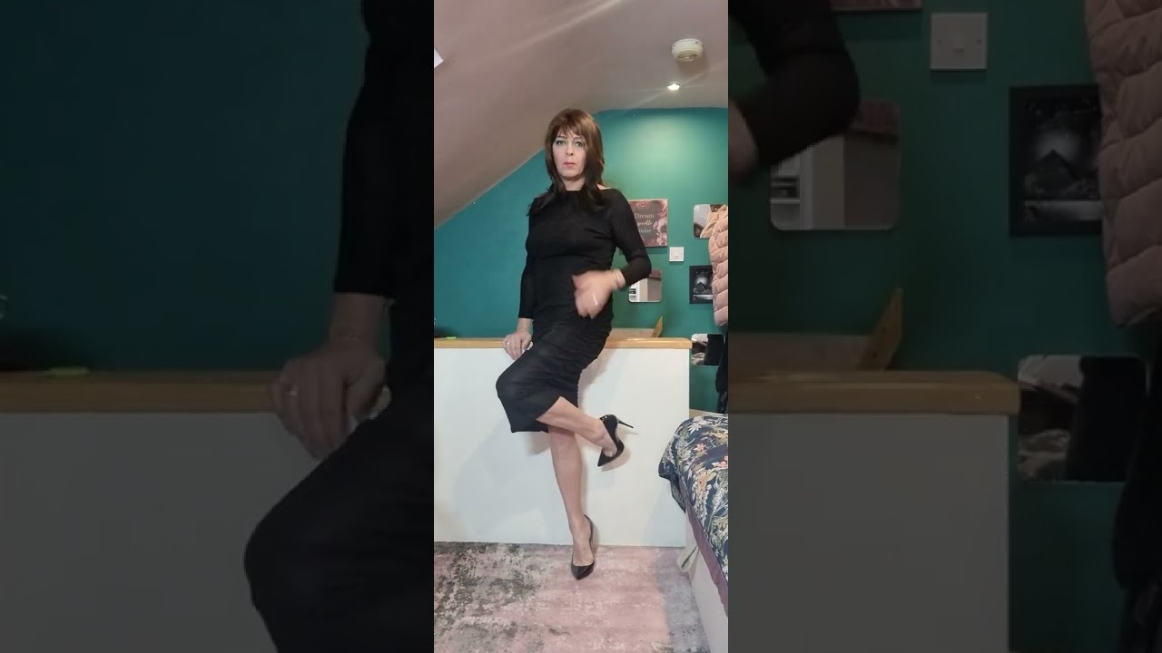 elegant black dress and heels. (transgender)