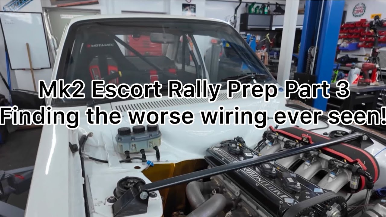 Mk2 Escort rally prep part 3 starting to strip shell, removal of roll cage. Finding terrible wiring.