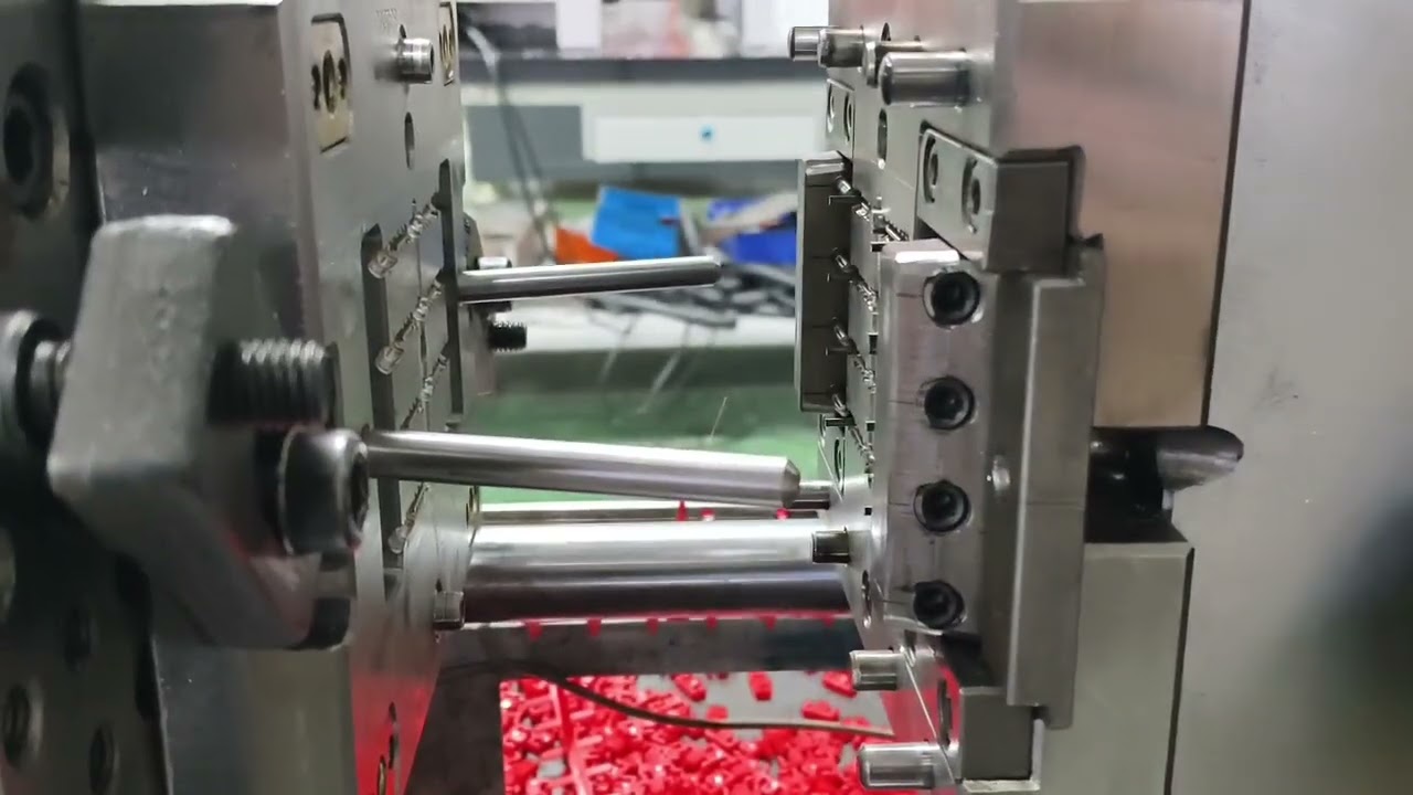 Injection molding production of wall anchor