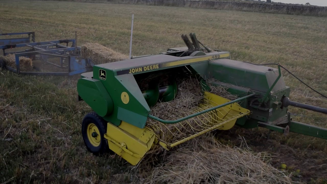 MF 3075 Baling Straw with John Deere 459