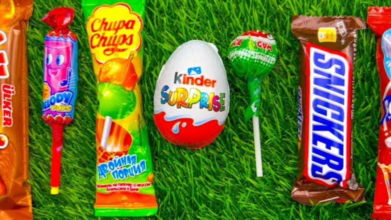 Most Asmr popular candys some lots of colorful rainbow lollipop candy unpacking chocolate eat
