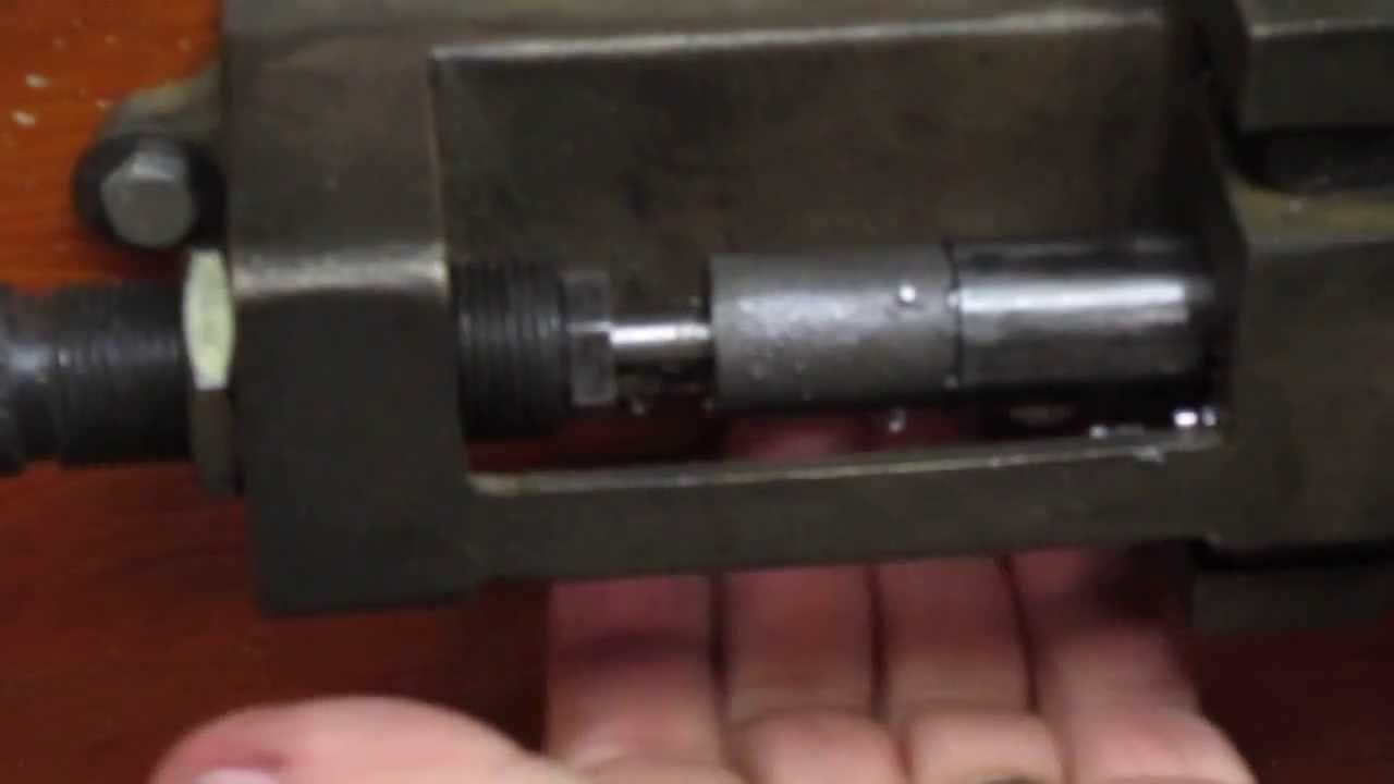Swaging lead bullet cores down to desired weight.