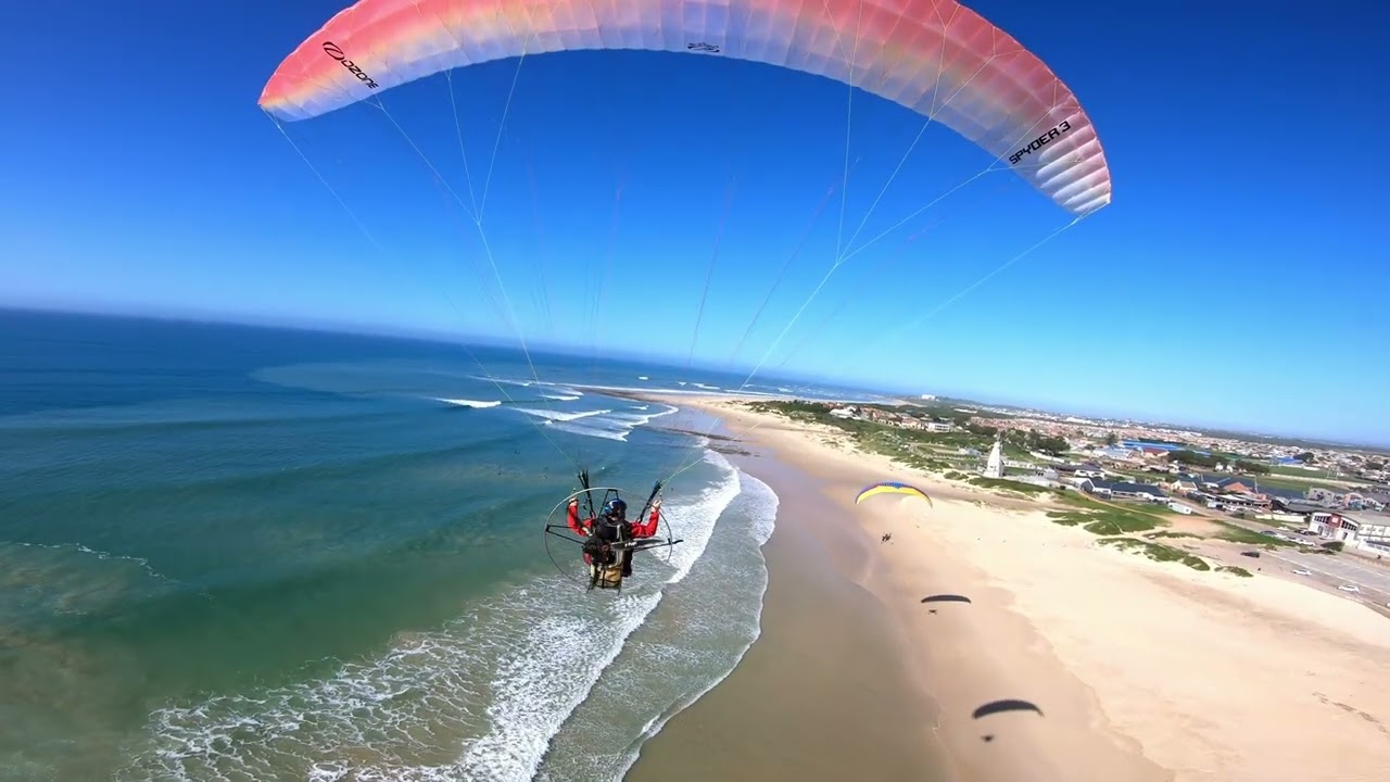 Endless foot drags on the pristine beaches of Jeffreys Bay flying my Ozone Spider 3.