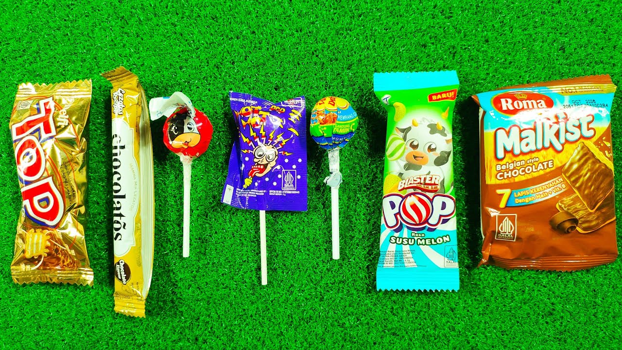 some lot's of candy and sweets lollipops unpacking chocolate ASMR satisfying video