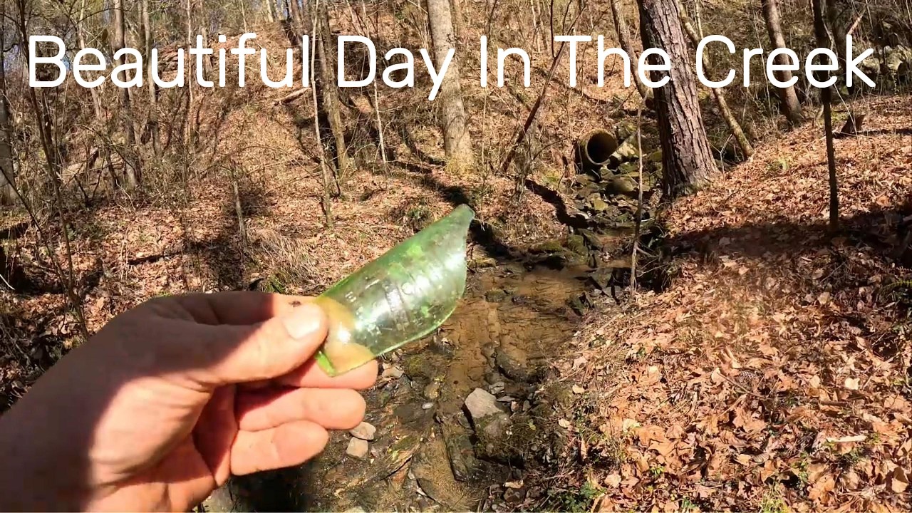 Mudlarking in  a Coal Mine Creek