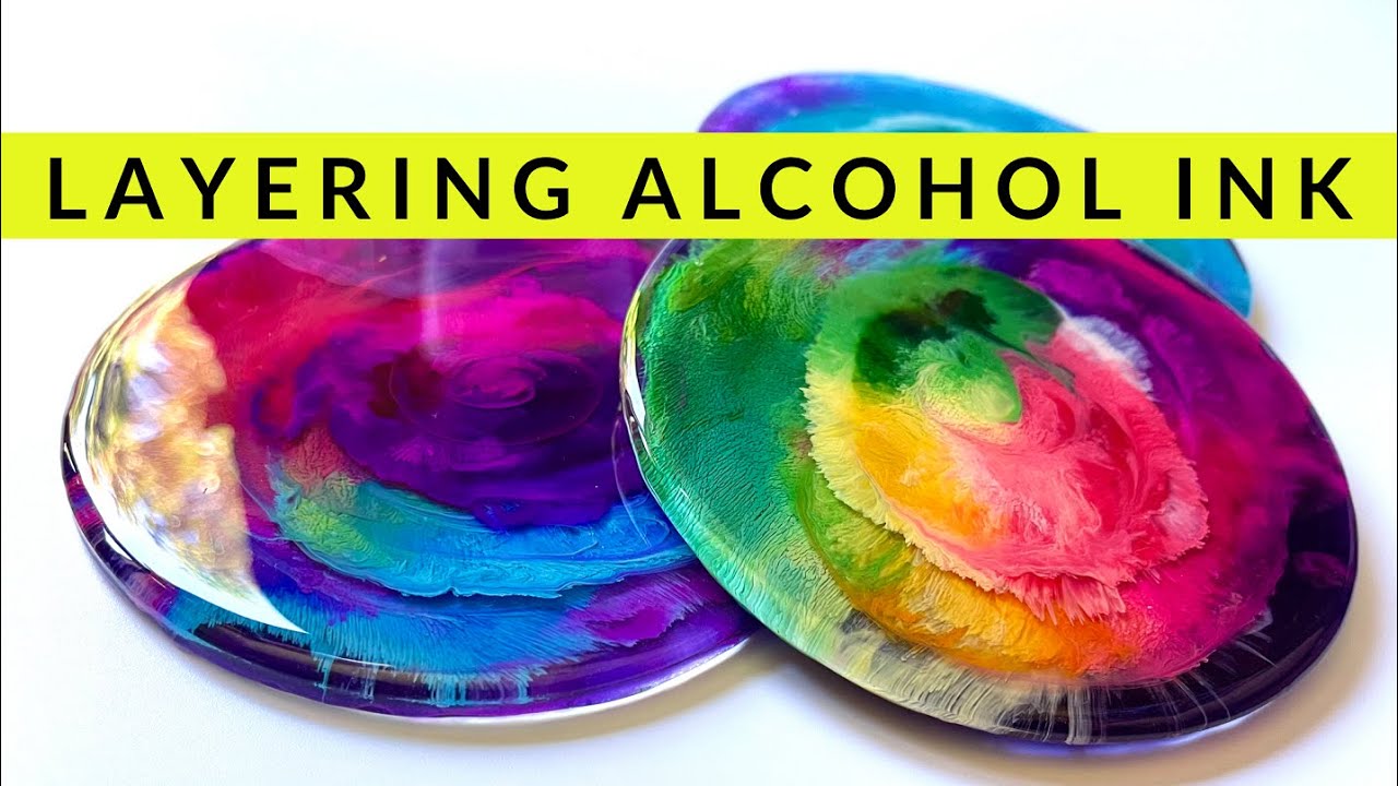 The stunning effect of layering Alcohol ink in resin: Vibrant Rainbow and ocean colors