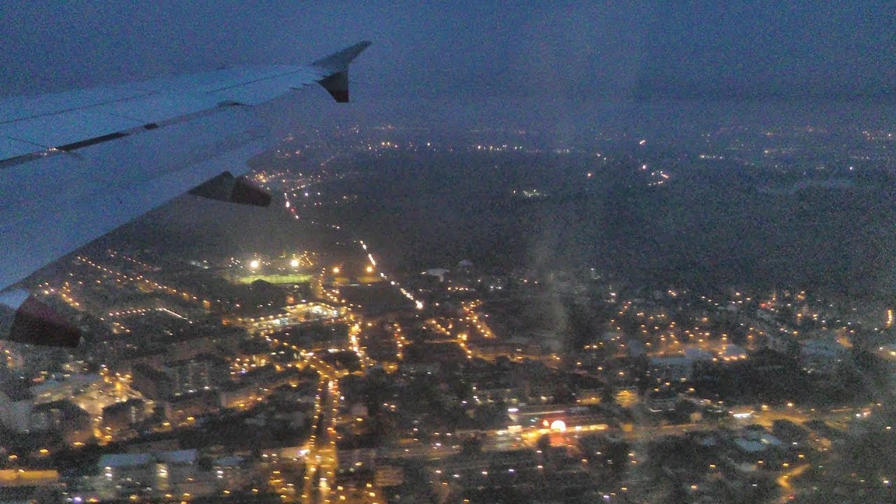 Evening Landing in Turin Airport, Italy. Snowy Mountains at Sunset. Airbus A320 British Airways