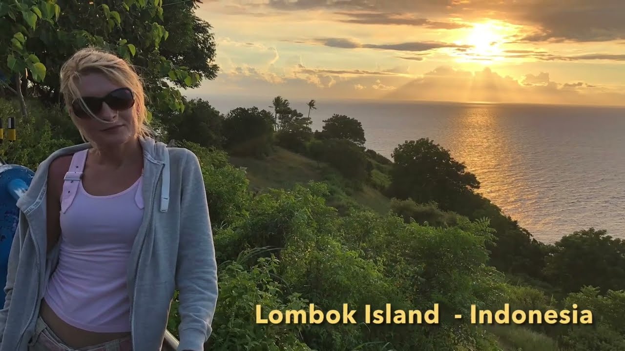 Sunset over the Lombok Island - Blonde is singing  - Indonesia.