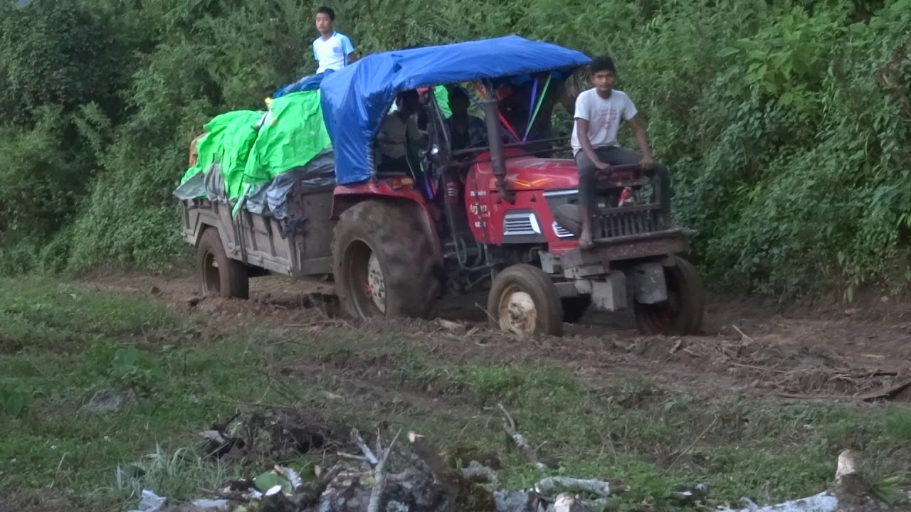 Dangerous Road Nepal|  Driving tractor in Mountain road.