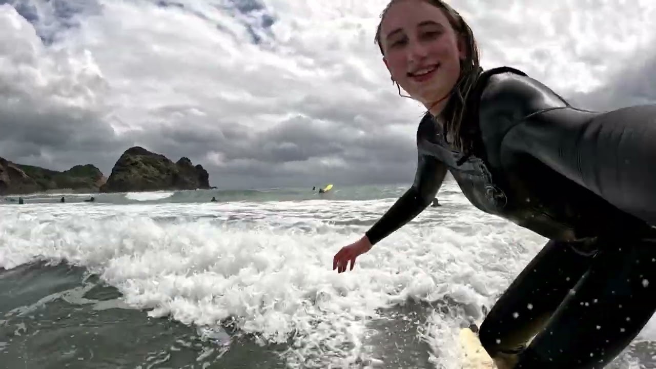 Damon, Addison, and Peyton at Piha Beach.