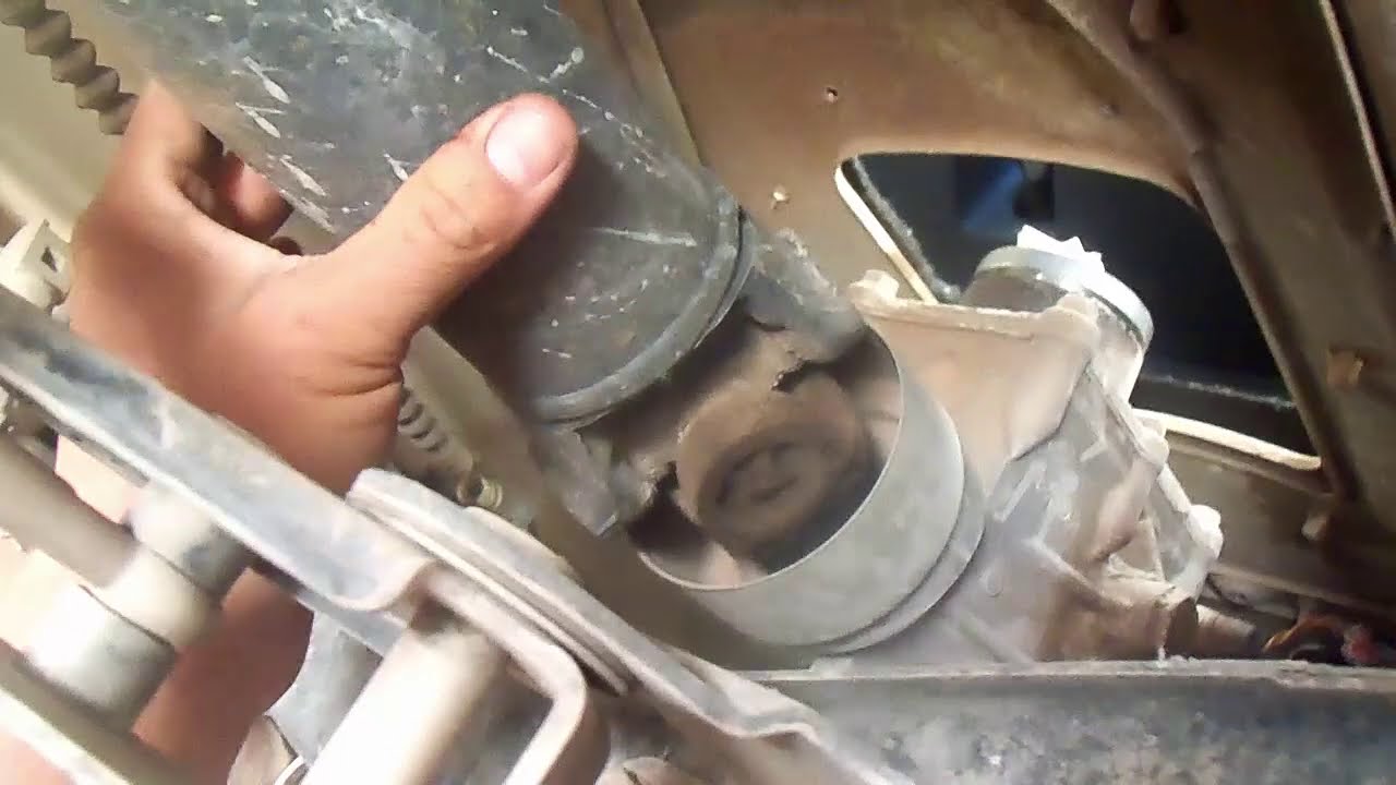 quitar la transmisión para cambiar la prensa de una camioneta NISSAN