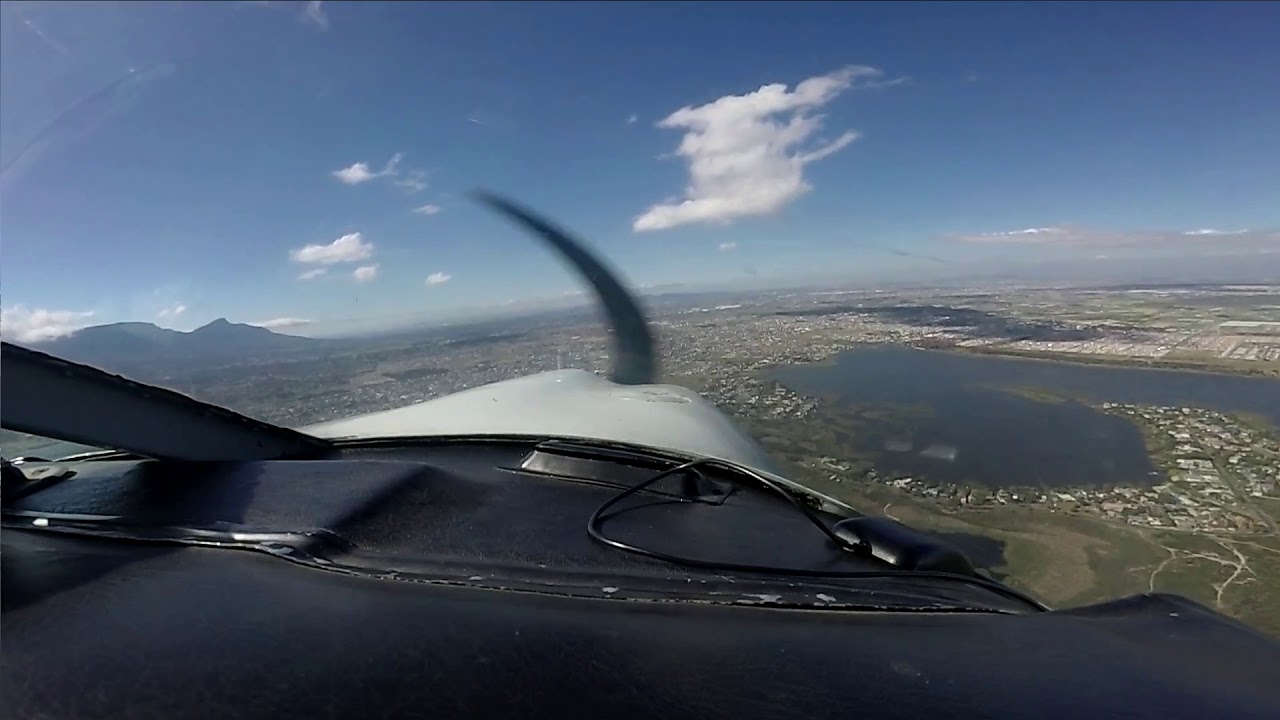 Piper 180 landing ATC at Cape Town International  -Katie Gray