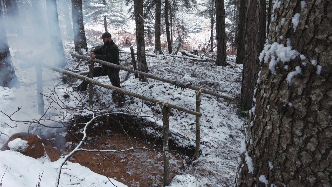 6 SURVIVOR SHELTER buildings in the woods.Made of plastic film.Snow.Wooden.and underground