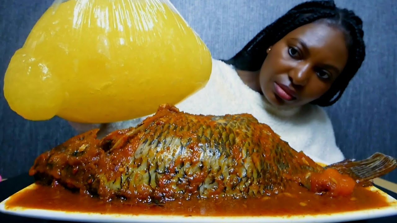 Asmr mukbang delicious tilapia fish pepper soup with starch fufu 🌶