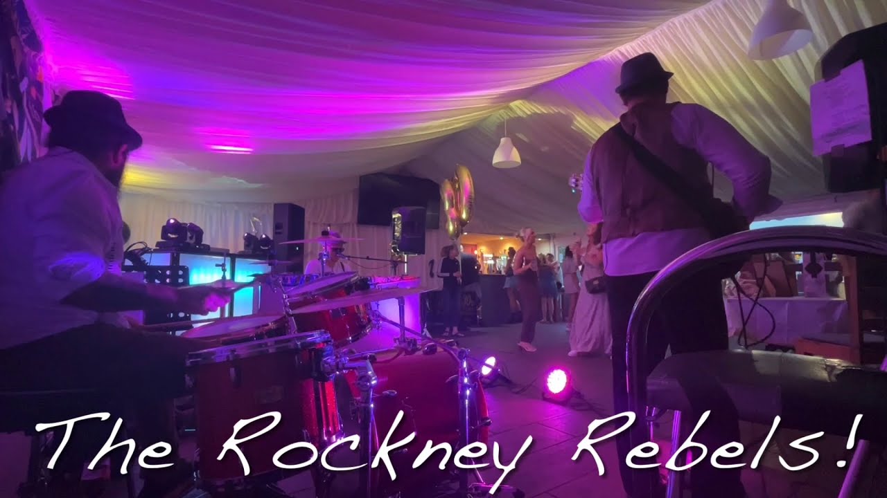 Playing drums for the Rockney Rebels!