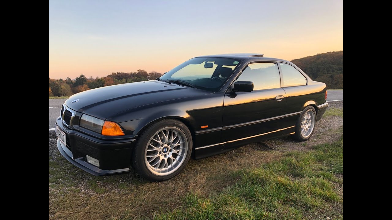 E36 323i Coupe cruising downtown