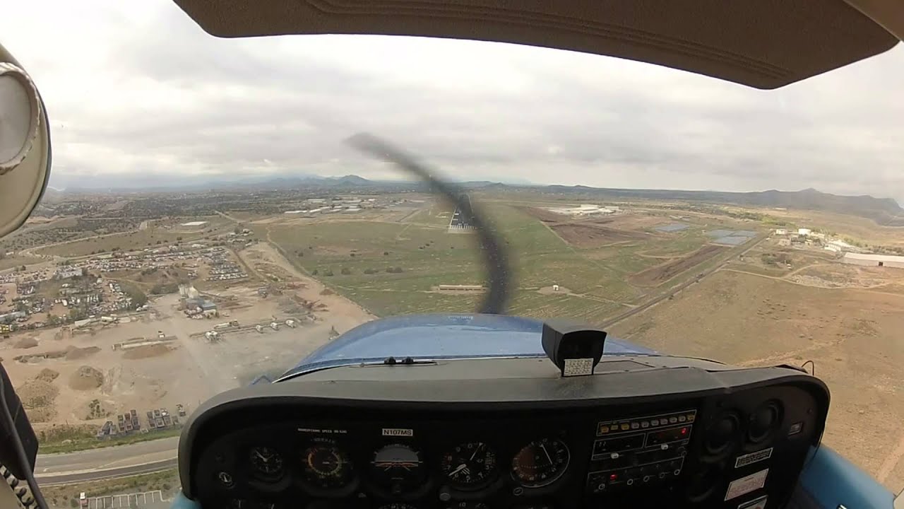 Two flight instructors flying a cessna 172 in cross wind landings at Santa Fe New Mexico