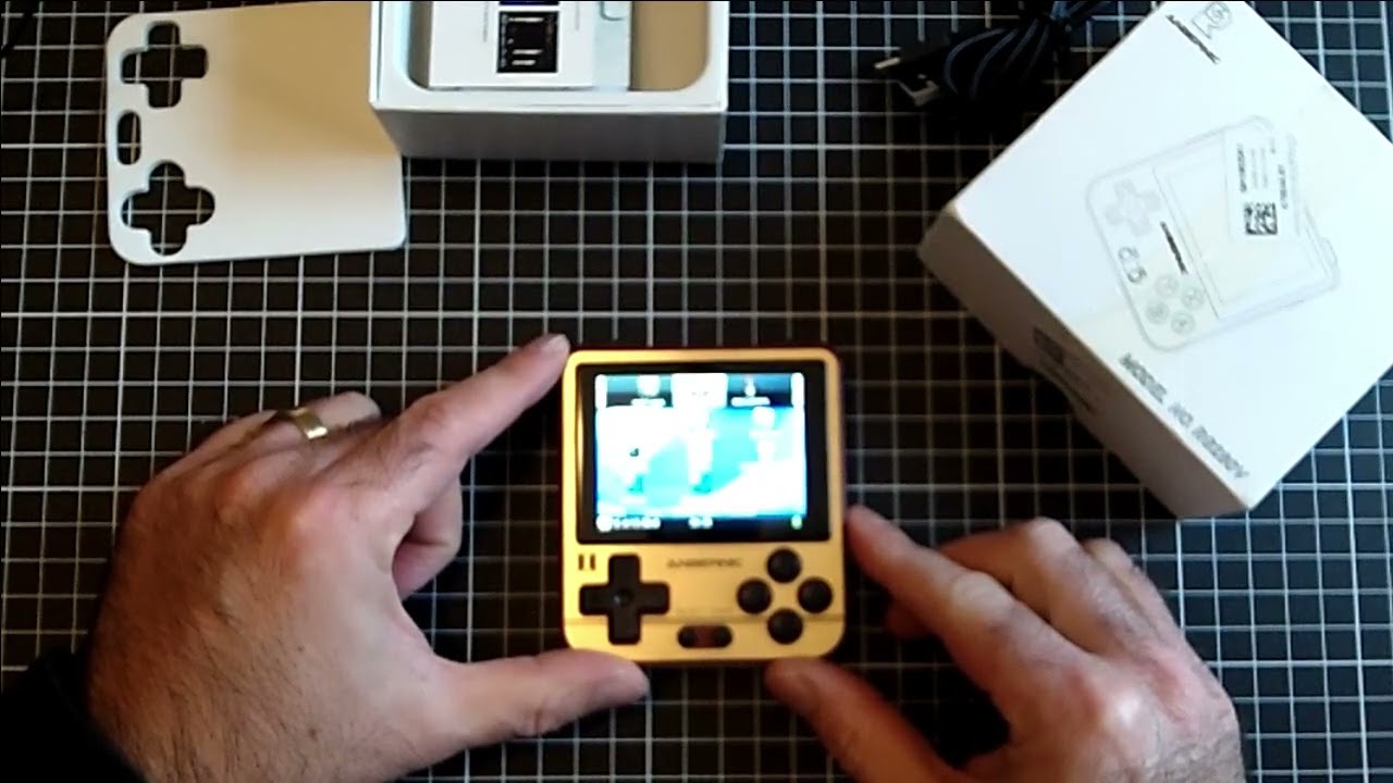 Quick unbox of the Anbernic rg280v running LGPT
