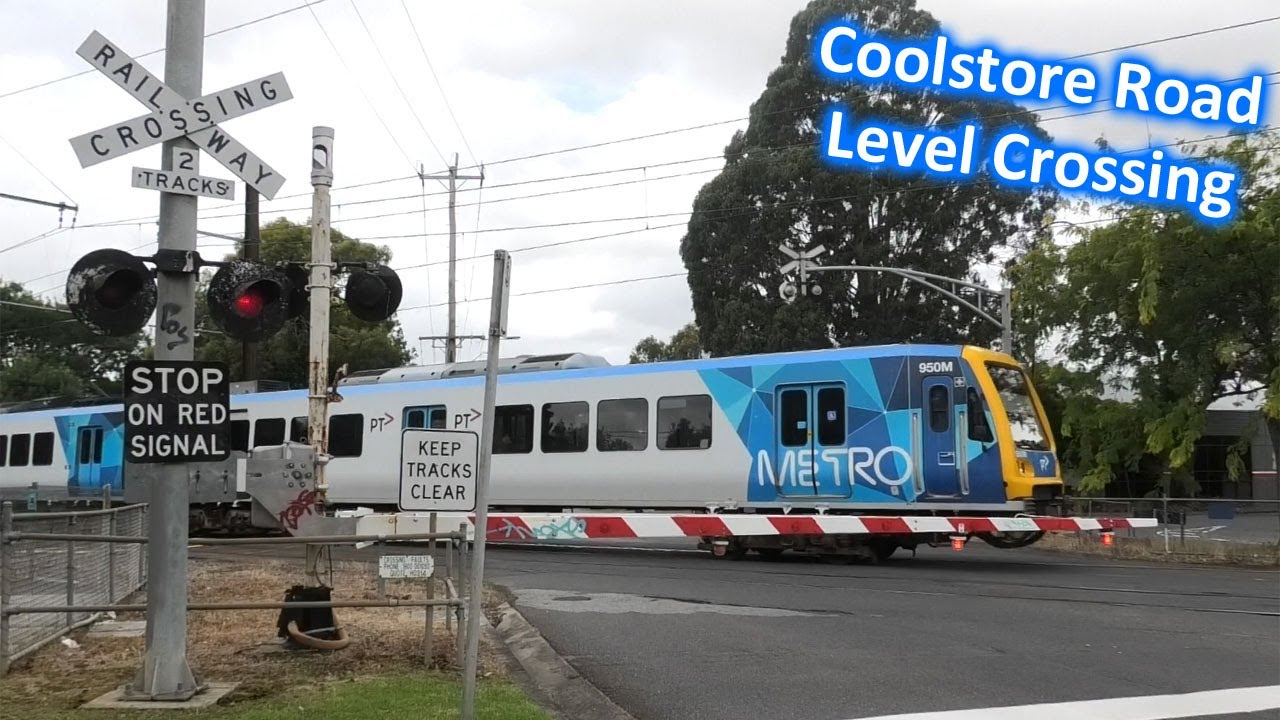 Trains at the Coolstore Road, Croydon Level Crossing - Metro Trains Melbourne