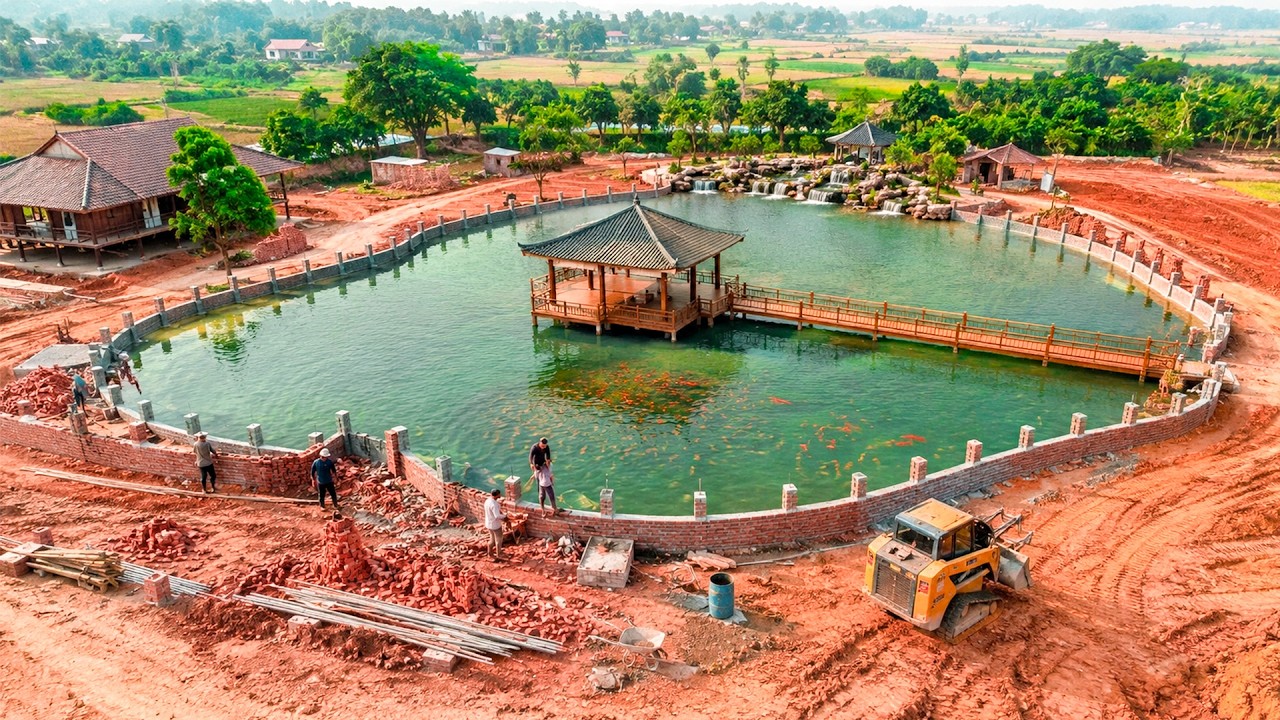 Building a huge brick fish pond with a wooden pavilion at our countryside home. | by @dangthimui