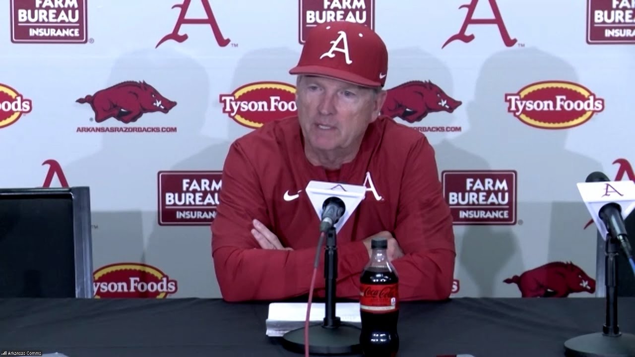 Dave Van Horn and players after #6 Arkansas baseball defeats Arkansas State