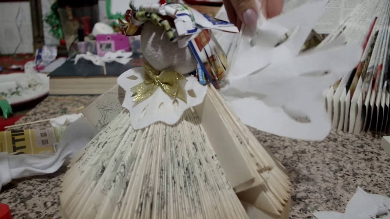 angelo con un libro e cose di riciclo parte 2