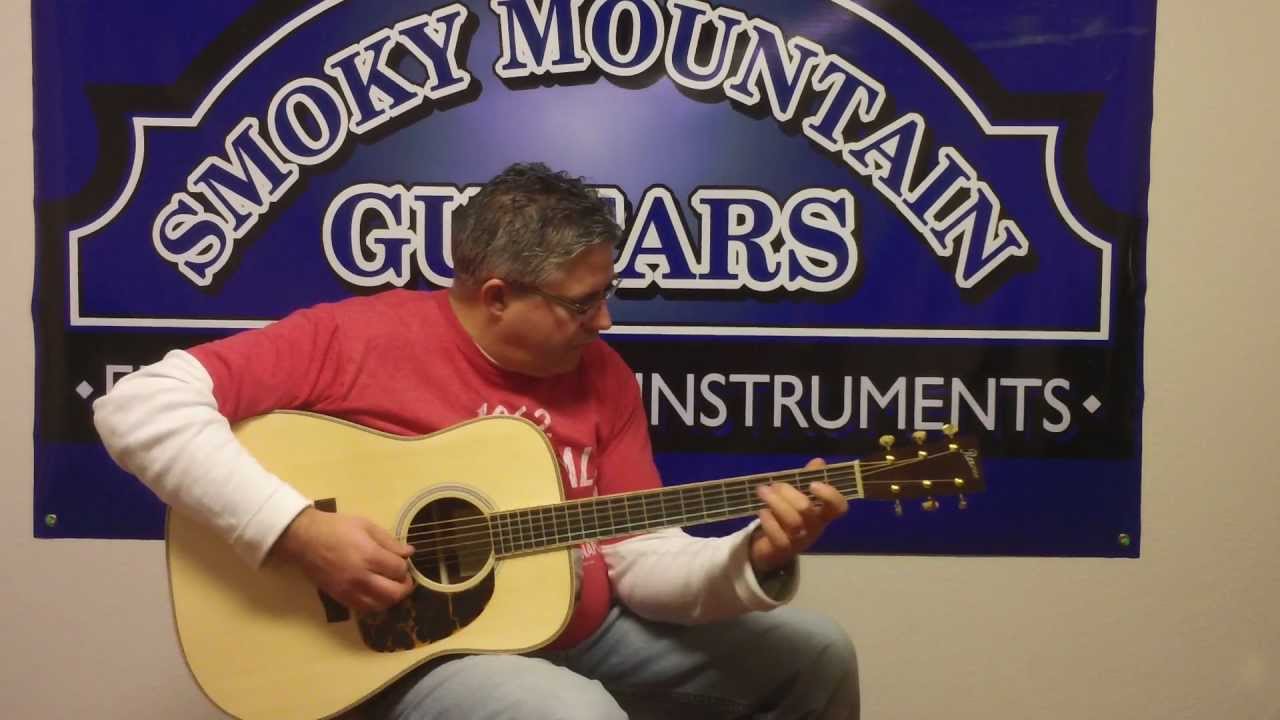 Kenny Smith plays a custom Reeves Madagascar Rosewood Guitar