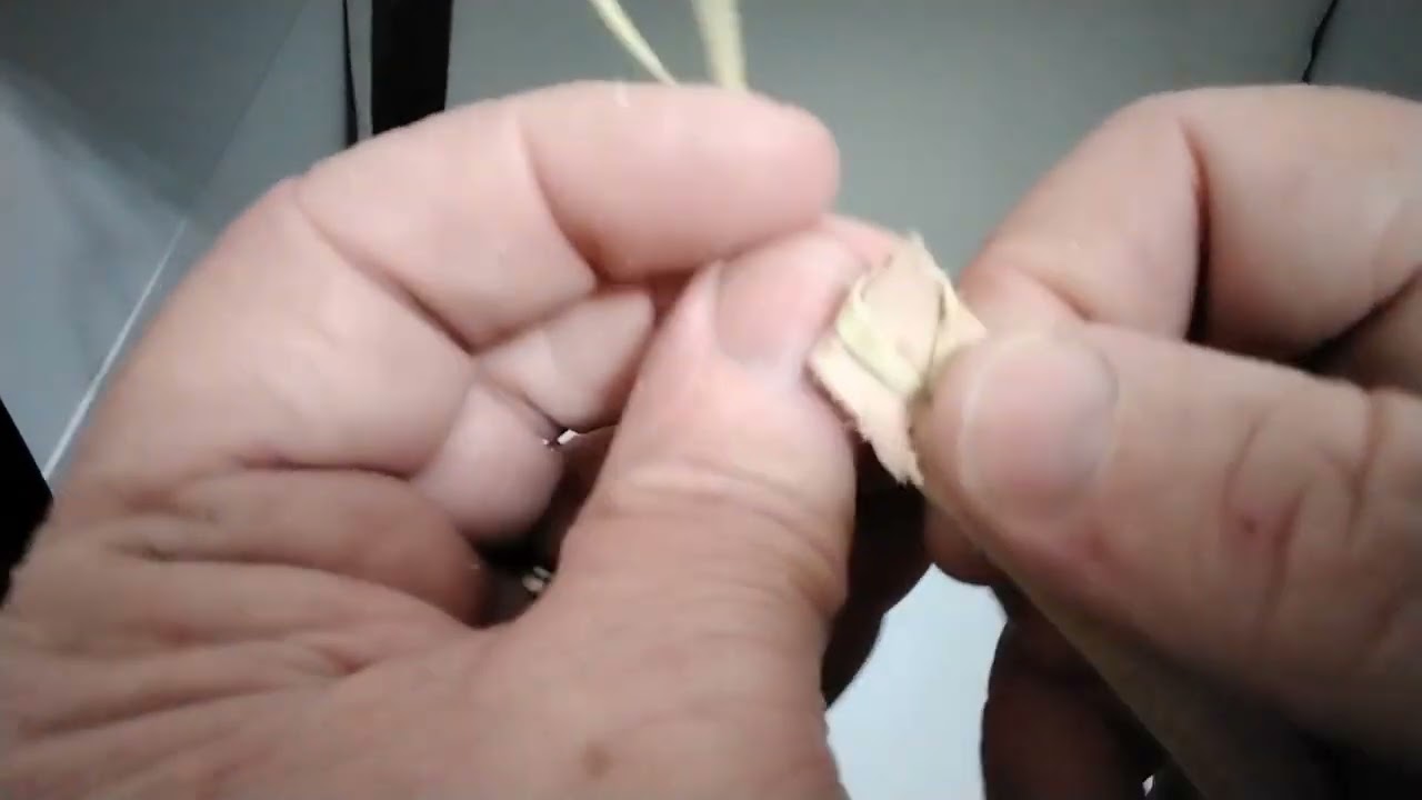 How to bevel tapered strips of leather close up hand shape,  hotel room card and scalpel