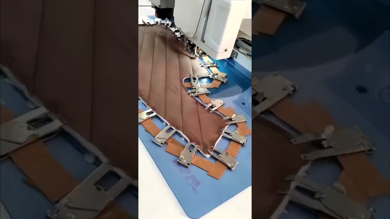The secrets of quilting: the exquisite production process in the garment factory. 