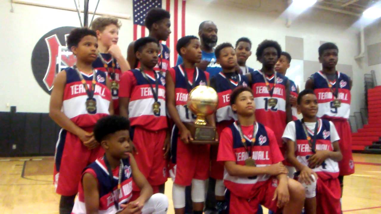 Aau trophy celebration team wall