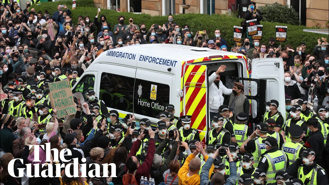 Glasgow protesters celebrate after blocking immigration raid