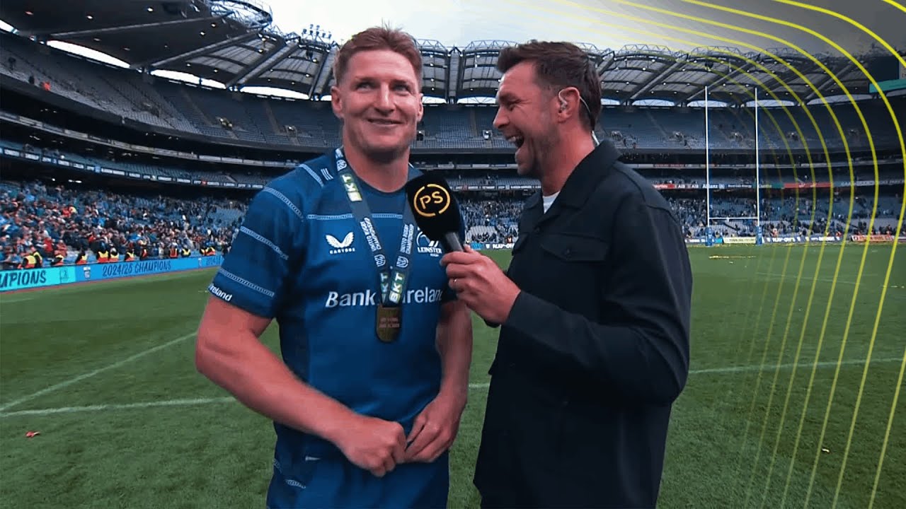 Ryan Wilson chats to victorious Leinster players after URC Grand Final at Croke Park