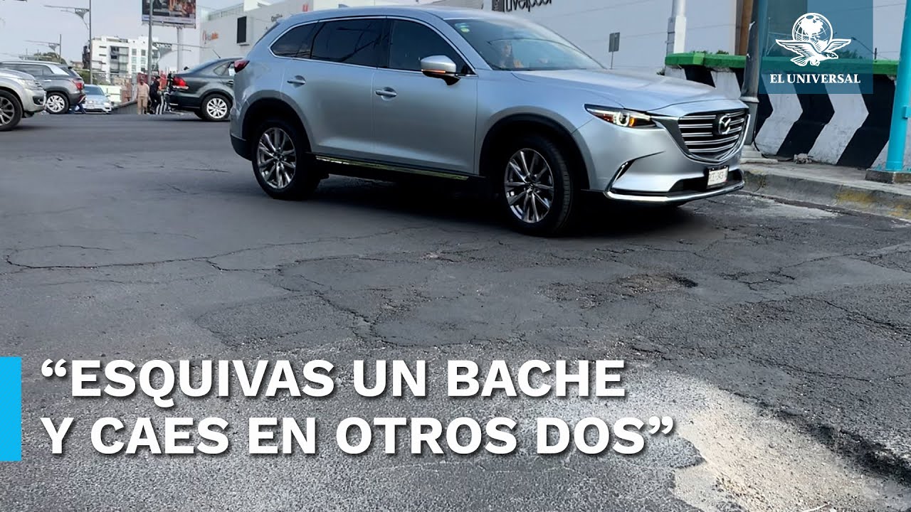 Enorme bache en Viaducto alerta a conductores de auto y moto