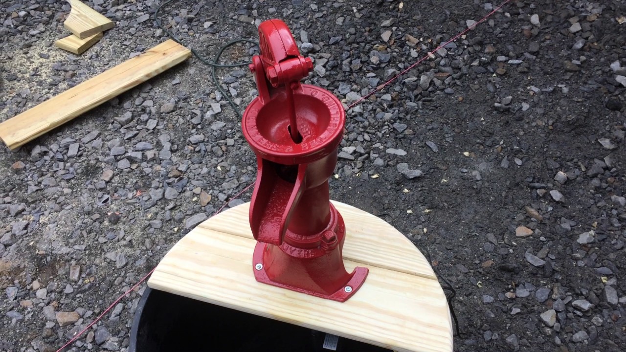 Well hand pump water fountain