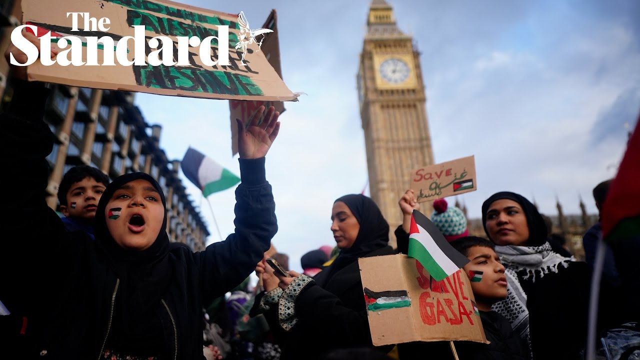 Pro-Palestinian protesters stage sit in at Westminster Bridge