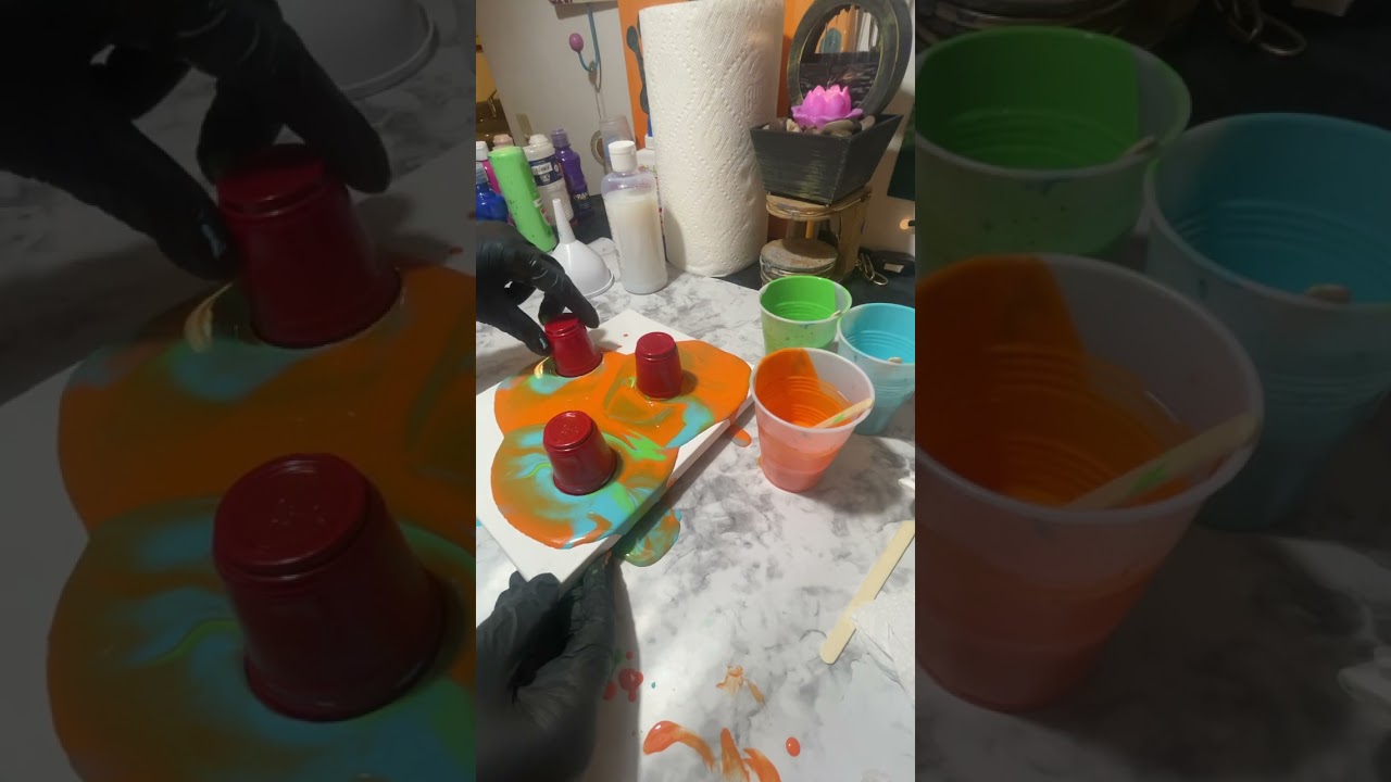"Unleashing the Colorful Chaos: The Mesmerizing World of Pouring Paint Art"