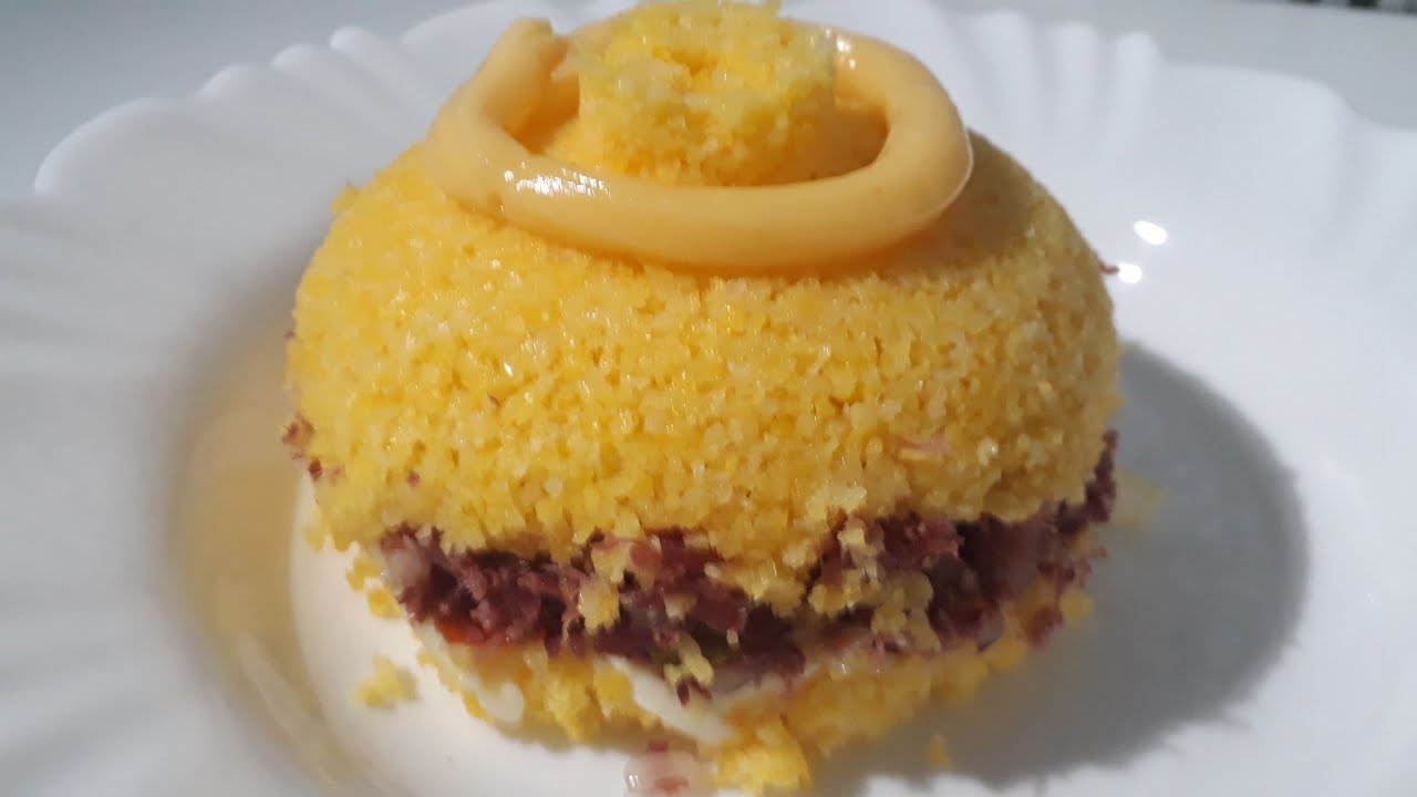 DELICIA DO NORDESTE, CUSCUZ COM CHARQUE E QUEIJO COALHO.