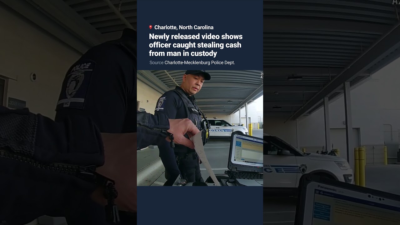 Newly released video shows officer accused of stealing cash from man in custody #shorts