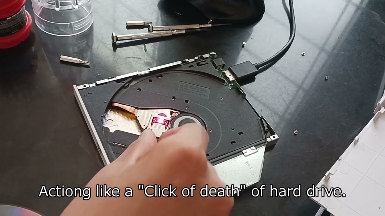 Inside slim tray DVD drive #2 Open top cover of internal drive and some experiments