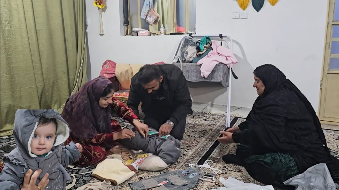 Hojat bought warm clothes for his daughter Ilma