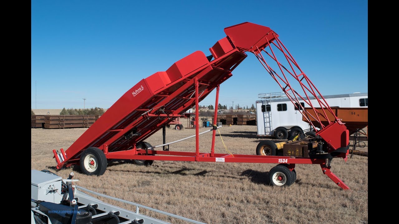 KUHNS 1534 small bale accumulator SELLS AT AUCTION
