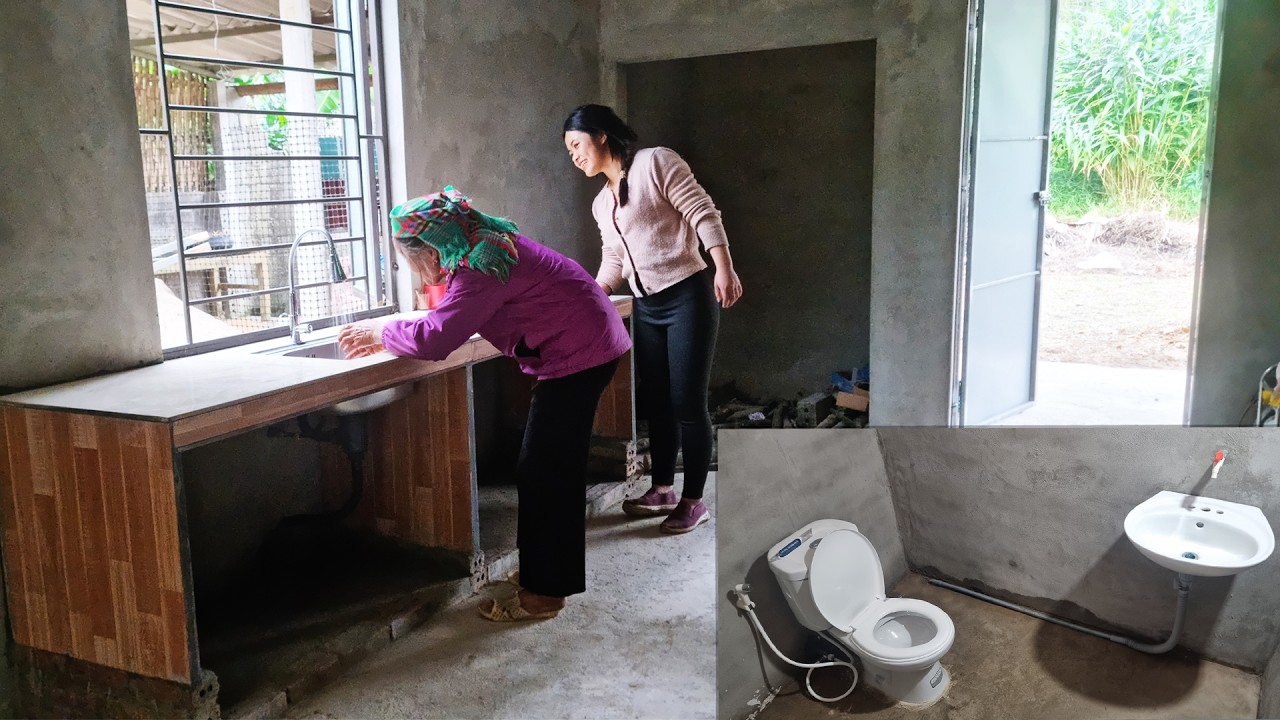 Helping an 85-Year-Old Woman Assemble a Kitchen Table and Install a Modern Toilet System