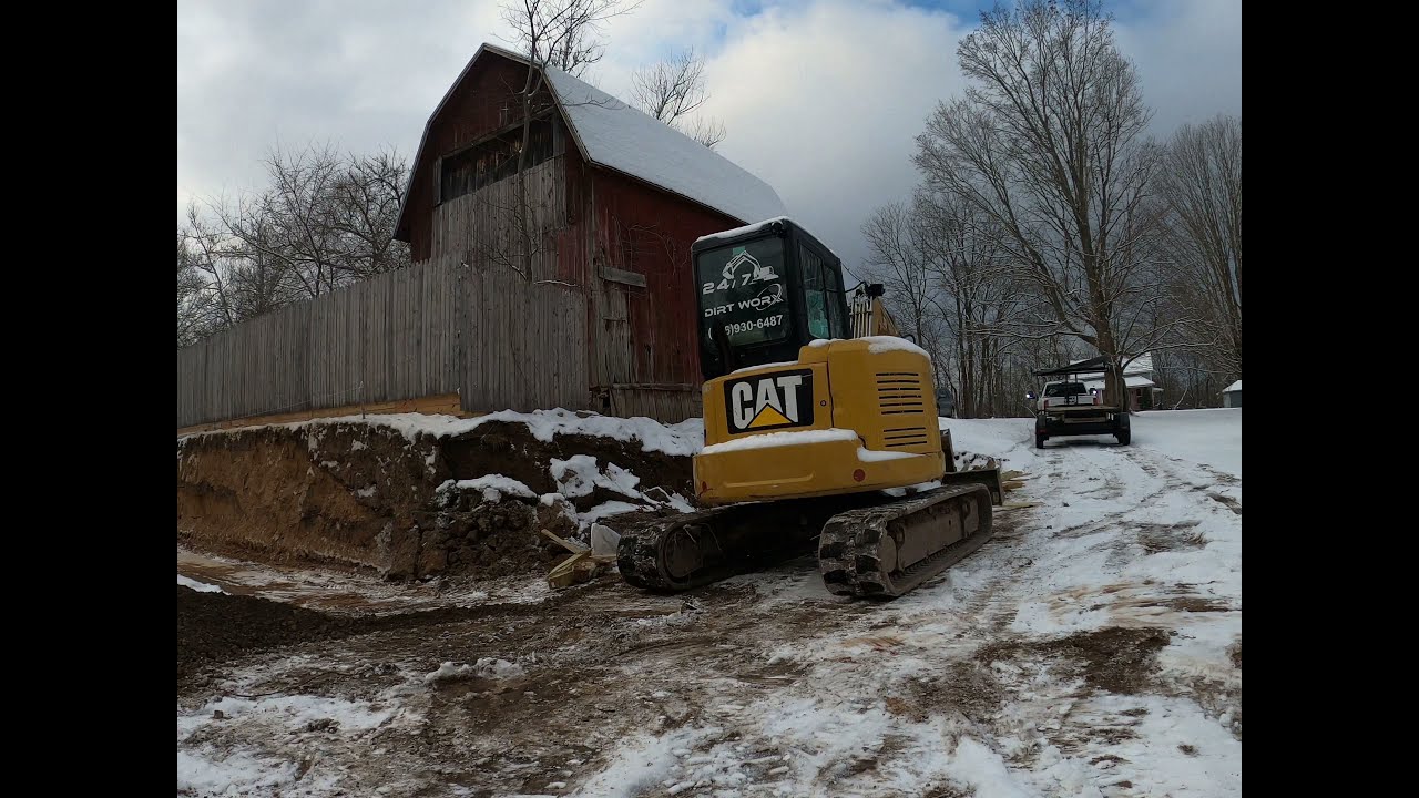 Building A Retaining Wall Using a 305  cat mini excavator