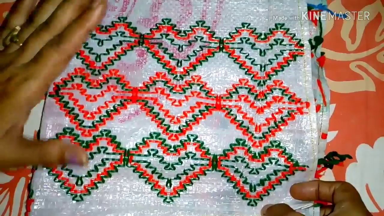 Heart shaped pattern on plastic Sack. Hand embroidery. Table mat stitch on plastic Sack.