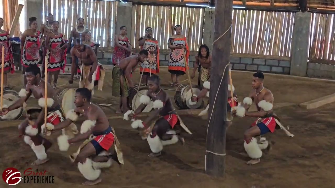 We enjoying the show in Mantenga Cultural village