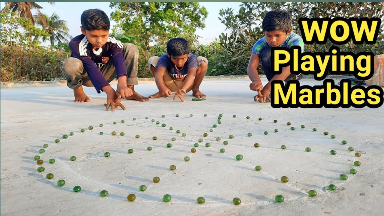 How to play Marbles || kid playing marbles || kanche goli game